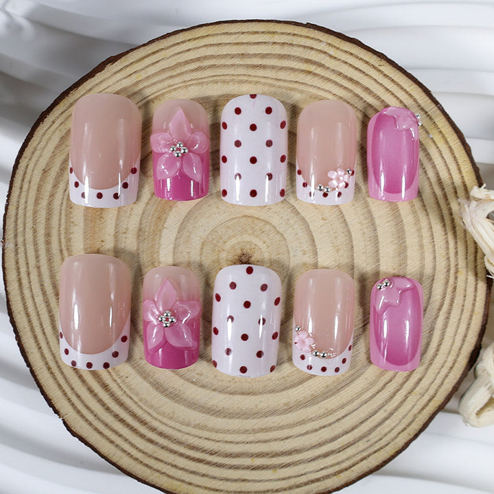 Artificial nail set with playful flower and dot motif Kalsten