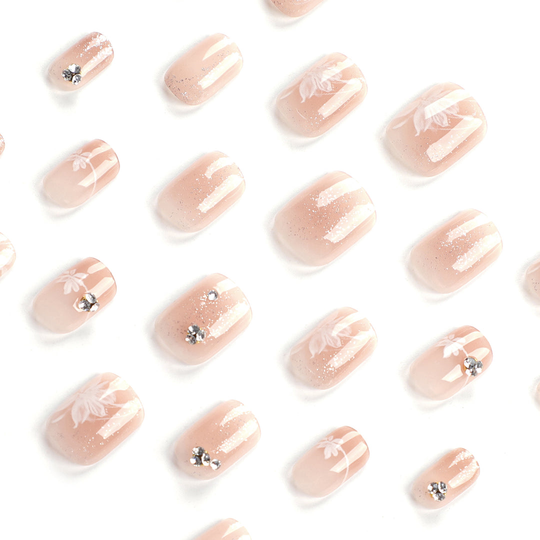 Elegant Nail Art with Holographic Accents and Floral Embellishments Kalsten