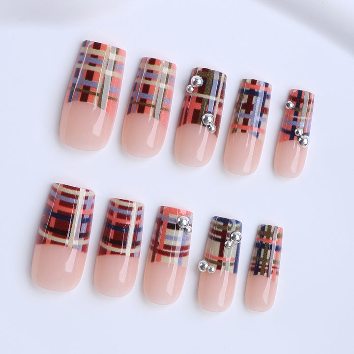 Artificial nails with geometric patterns and glossy accents Kalsten