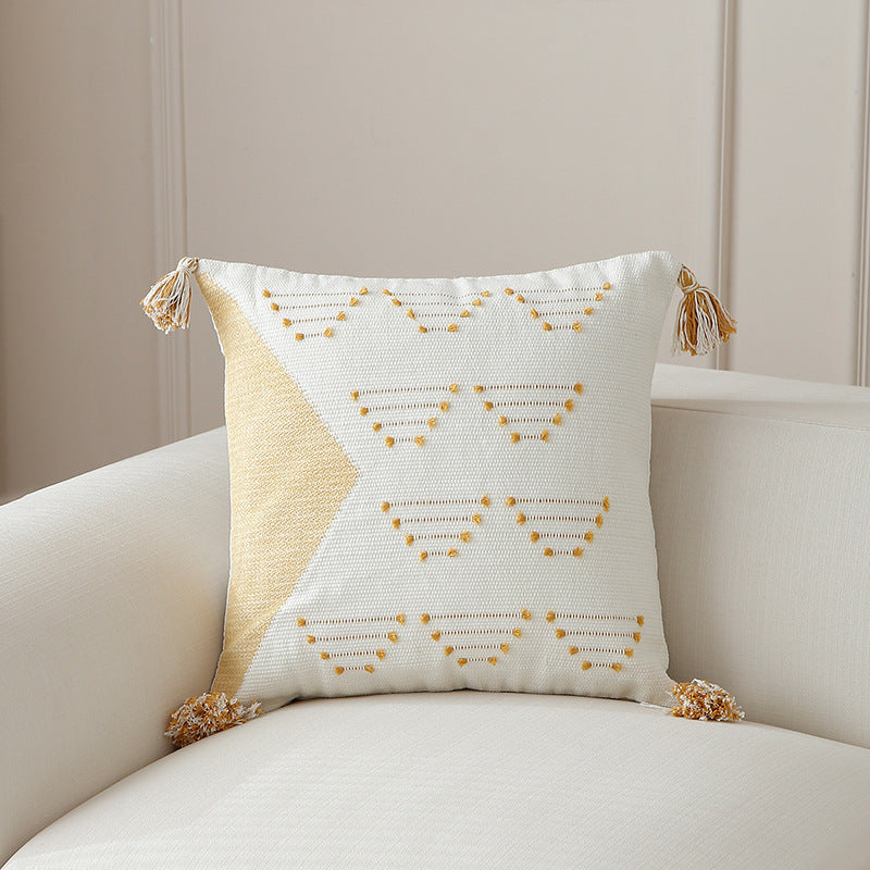 Decorative woven cushion cover with geometric tuft-relief and tassels Kalsten