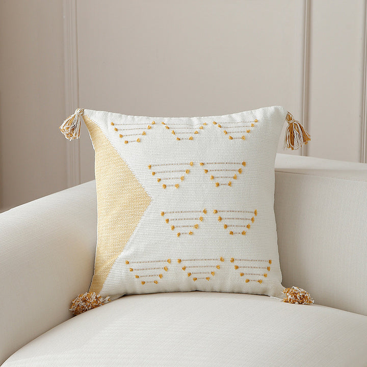 Decorative woven cushion cover with geometric tuft-relief and tassels Kalsten