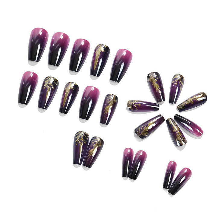 Artificial nails in elegant ombré design with gold accents Kalsten