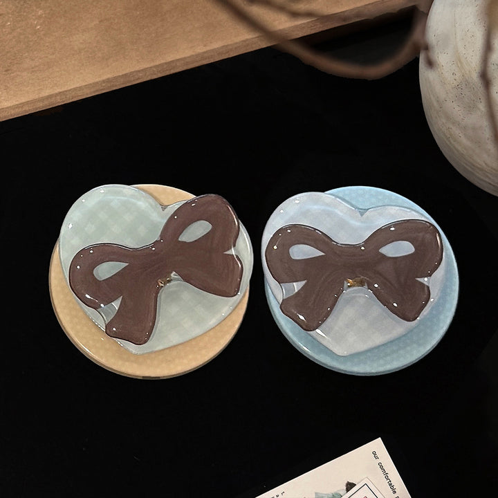 Decorative ceramic coaster with bow motif Kalsten