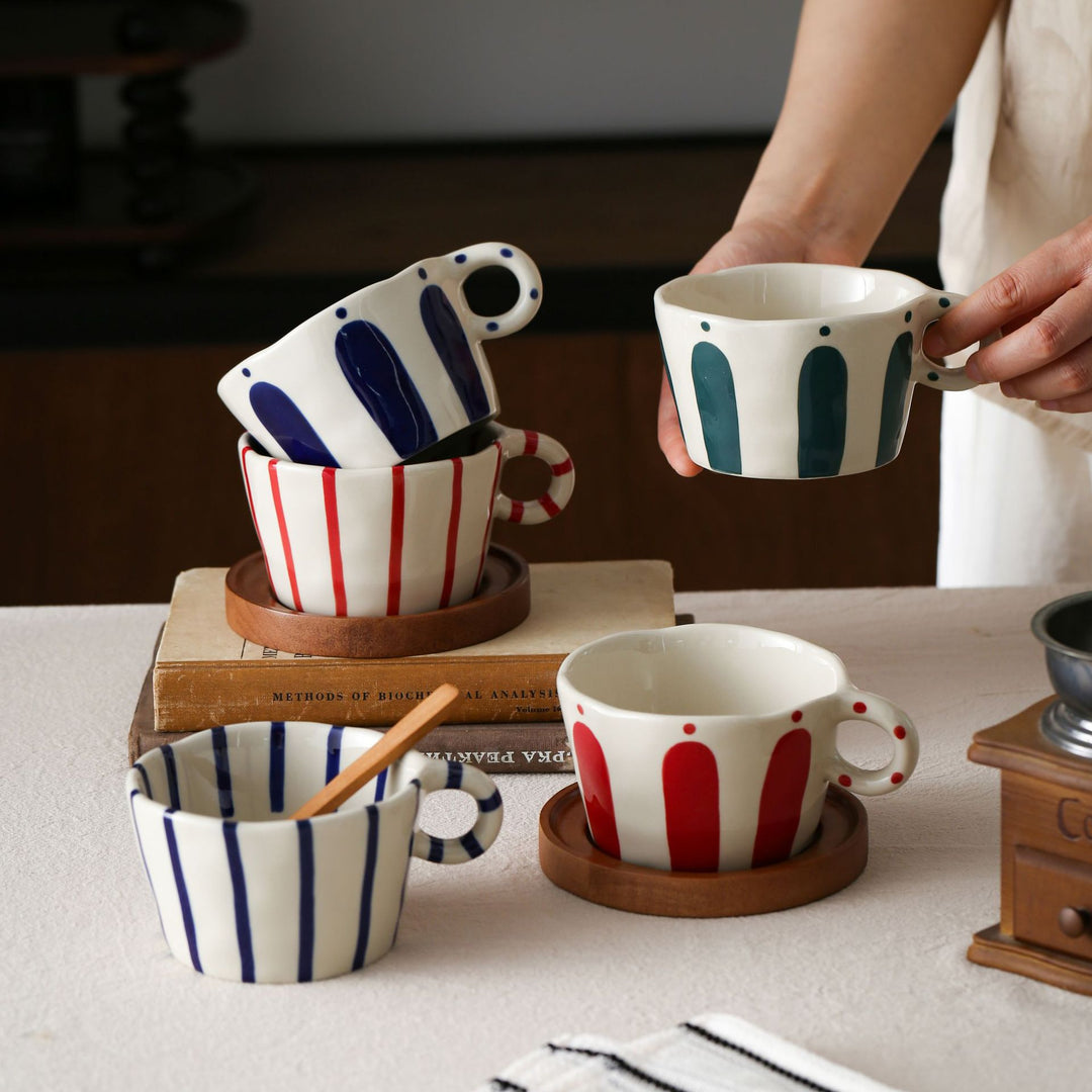 Handmade ceramic mug with ergonomic handle and wavy rim