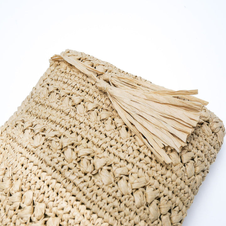 Woven natural material handbag with tassel Kalsten