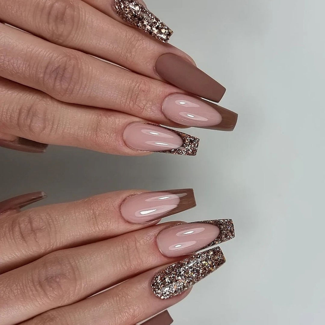 Artful stiletto nails with glitter embellishments Kalsten