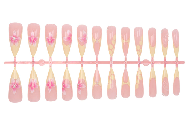 Acrylic nail set with elegant floral pattern and shimmering accents Kalsten