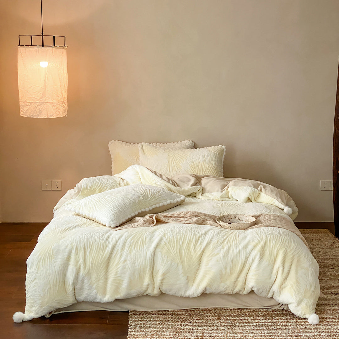 Cozy microfiber bedding set with jacquard floral relief and pompom edge