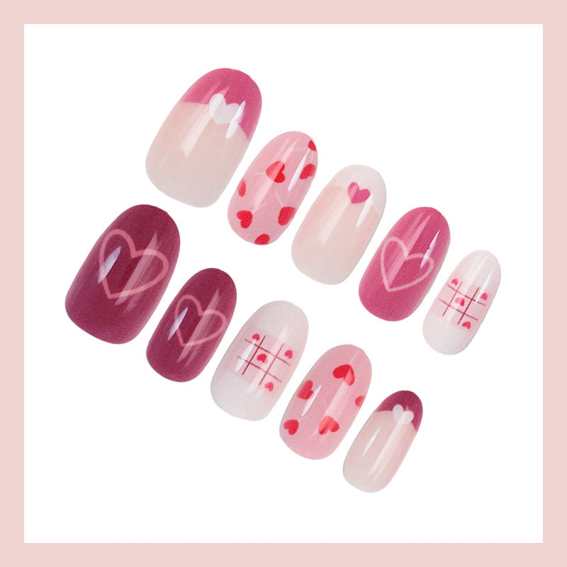 Acrylic nail set with romantic heart motif and creative patterns Kalsten