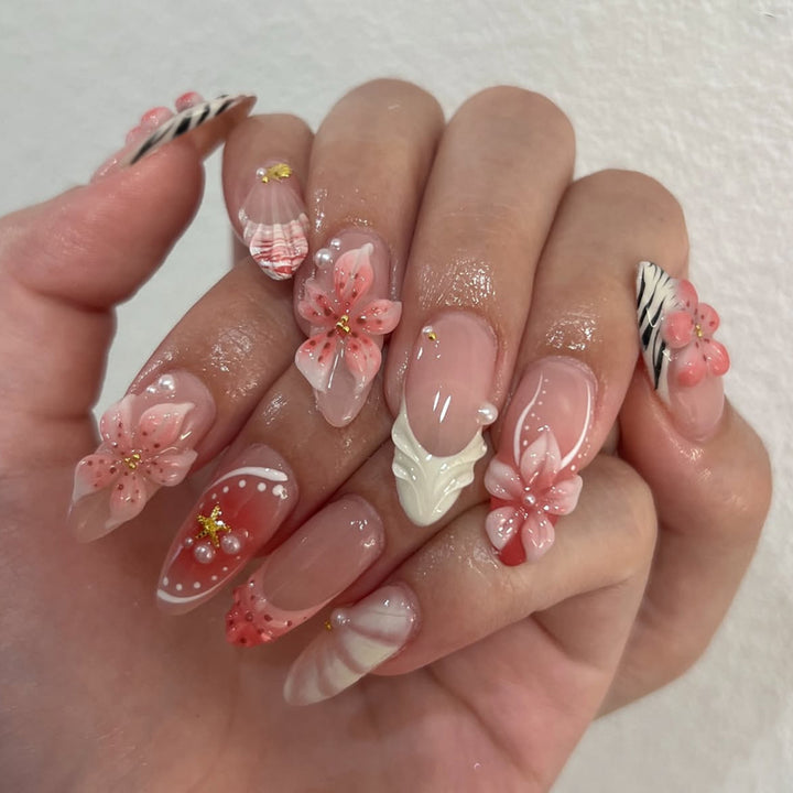 Artistic Nail Art with Floral and Elegant Accents Kalsten