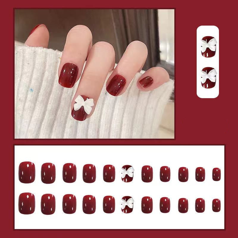Artificial nails with elegant bow motifs Kalsten