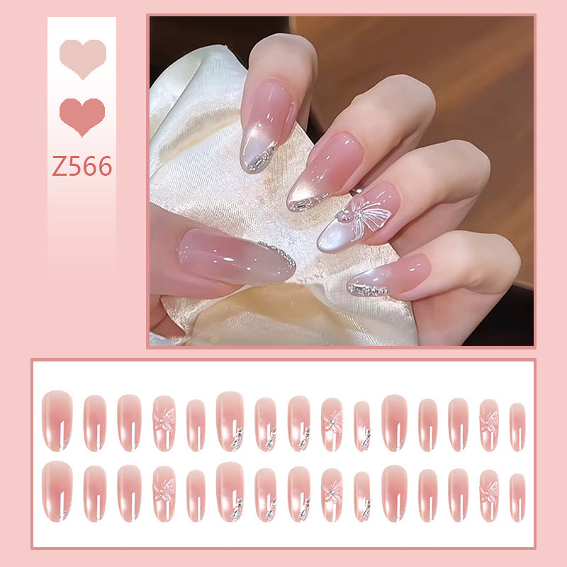 Acrylic nail set with elegant ombre design and sparkling accents Kalsten