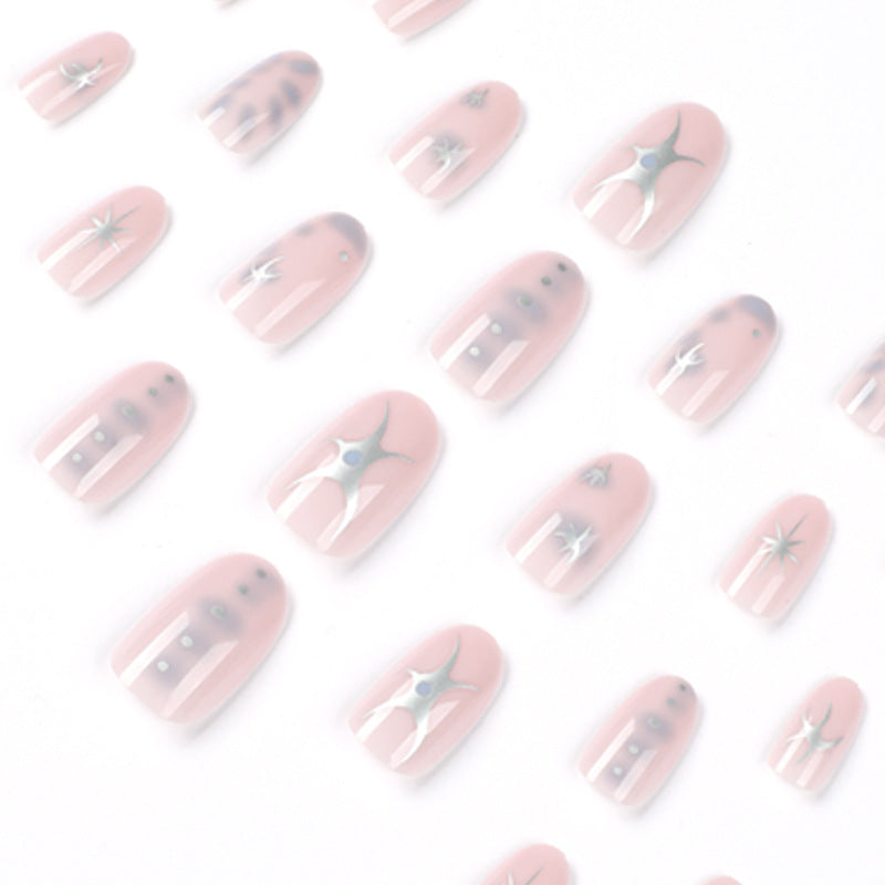 Elegant nail art with glamorous metal embellishments Kalsten