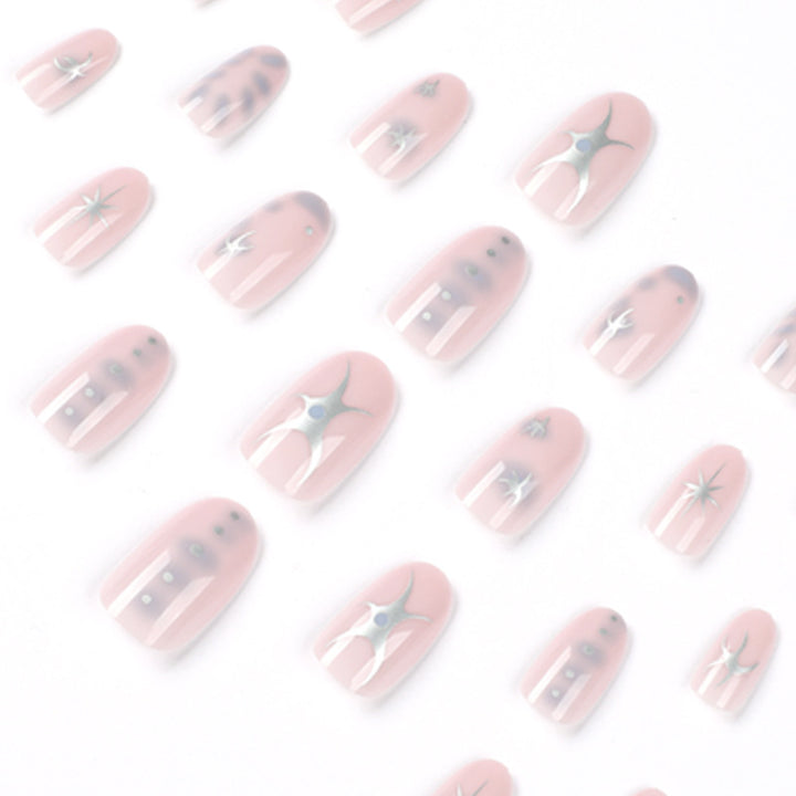 Elegant nail art with glamorous metal embellishments Kalsten