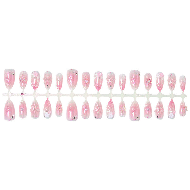 Acrylic nail set with elegant flower design and glitter accents Kalsten