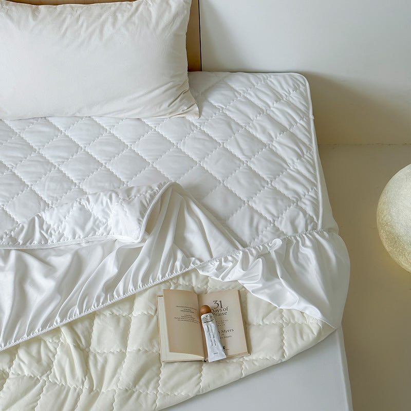 Quilted mattress topper with all-around elastic and breathable microfiber