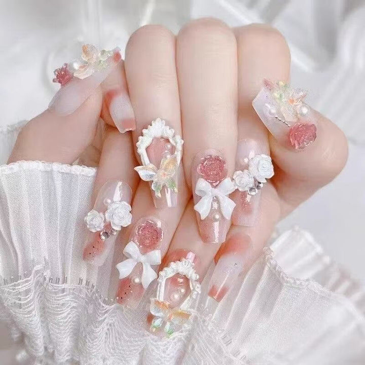 Artistic nail set with 3D flower and bow details Kalsten