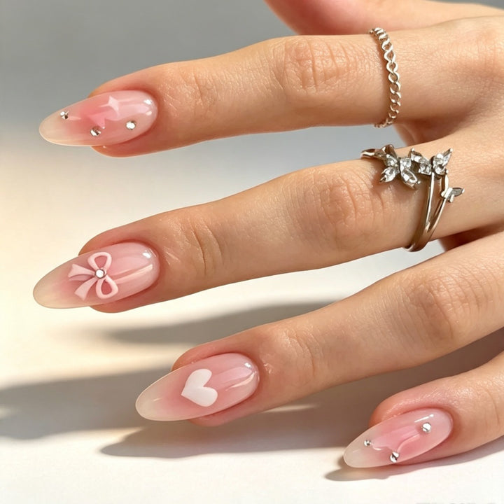 Artificial nails with romantic heart and bow design Kalsten