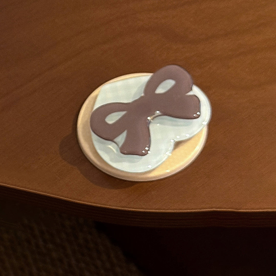 Decorative ceramic coaster with bow motif Kalsten