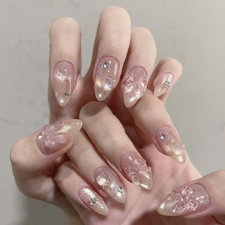 Artful stiletto nails with floral design and glitter accents Kalsten