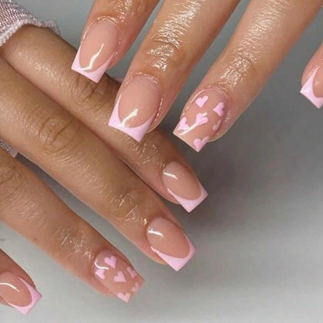Art nail set with romantic heart designs and elegant French design Kalsten