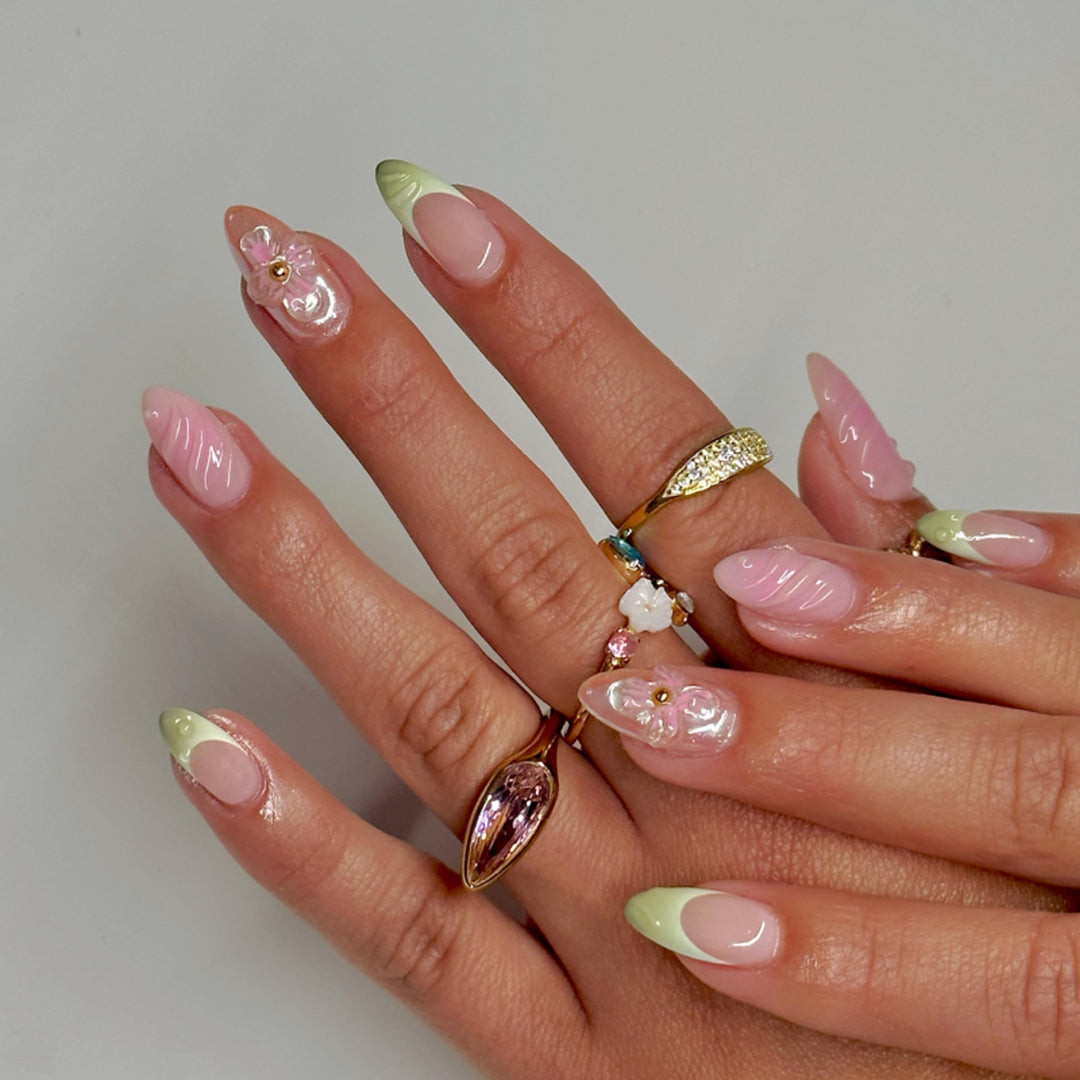 Artful Nail Extensions with Floral Design and Glamorous Accents Kalsten