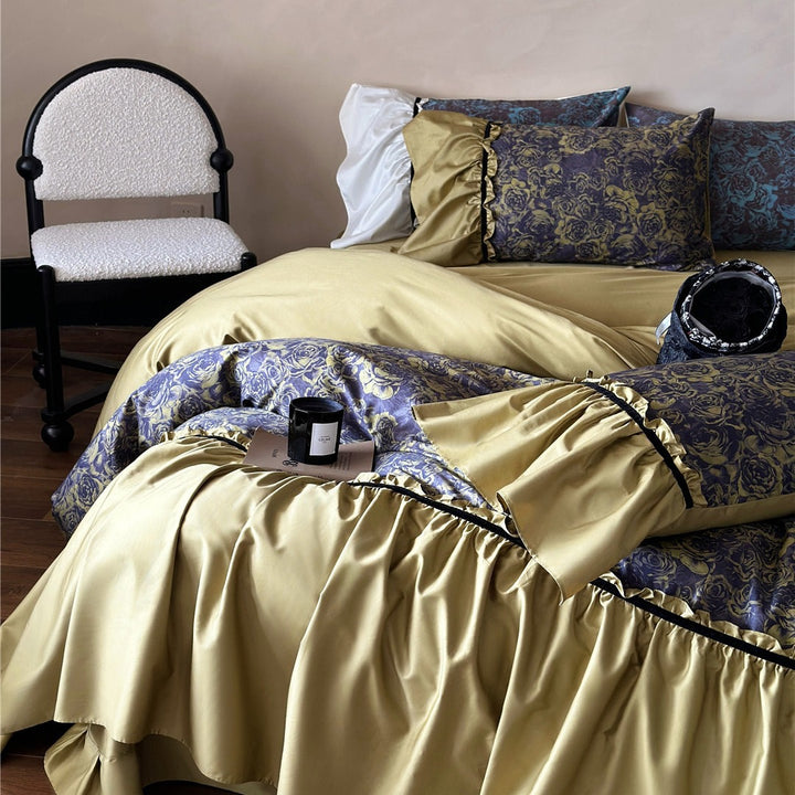 Reversible luxury bedding set made of cotton satin with gathered ruffle, floral jacquard inner side and contrasting velvet piping