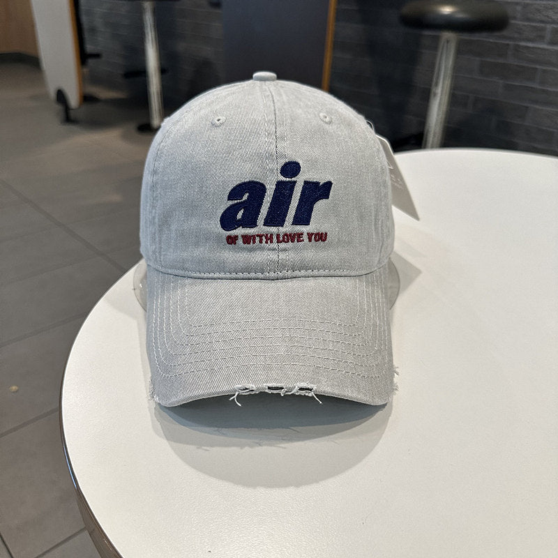 Distressed Denim Baseball Cap with Unique Embroidery