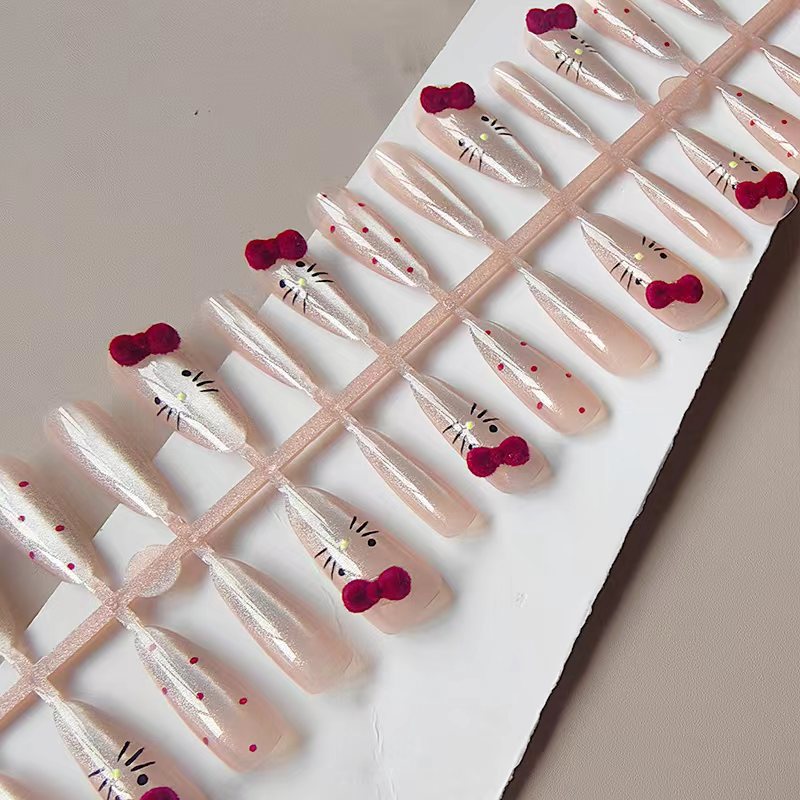 Artificial nails with playful Hello Kitty design Kalsten