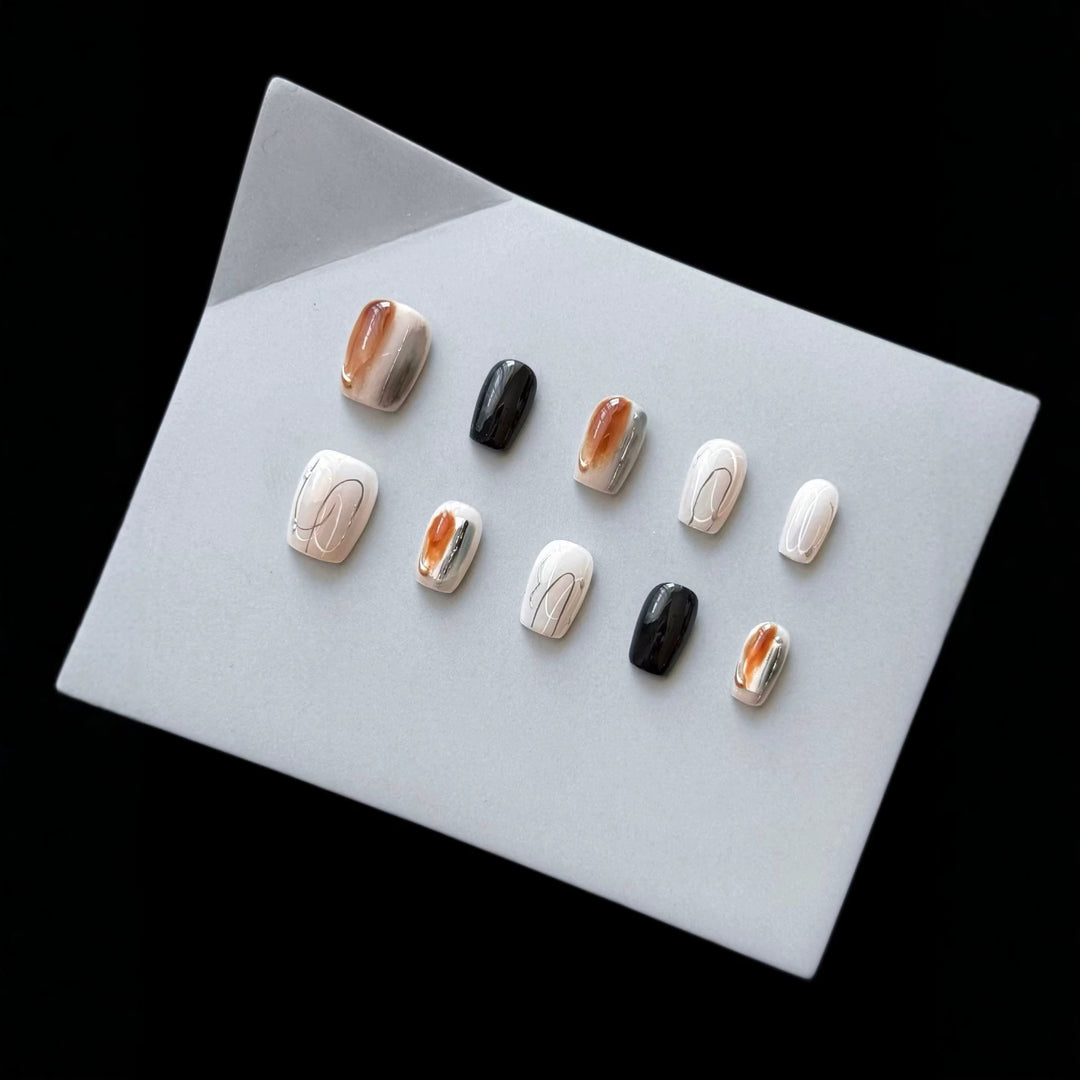Artistic Press-On Nail Set with Marble and Glossy Finish