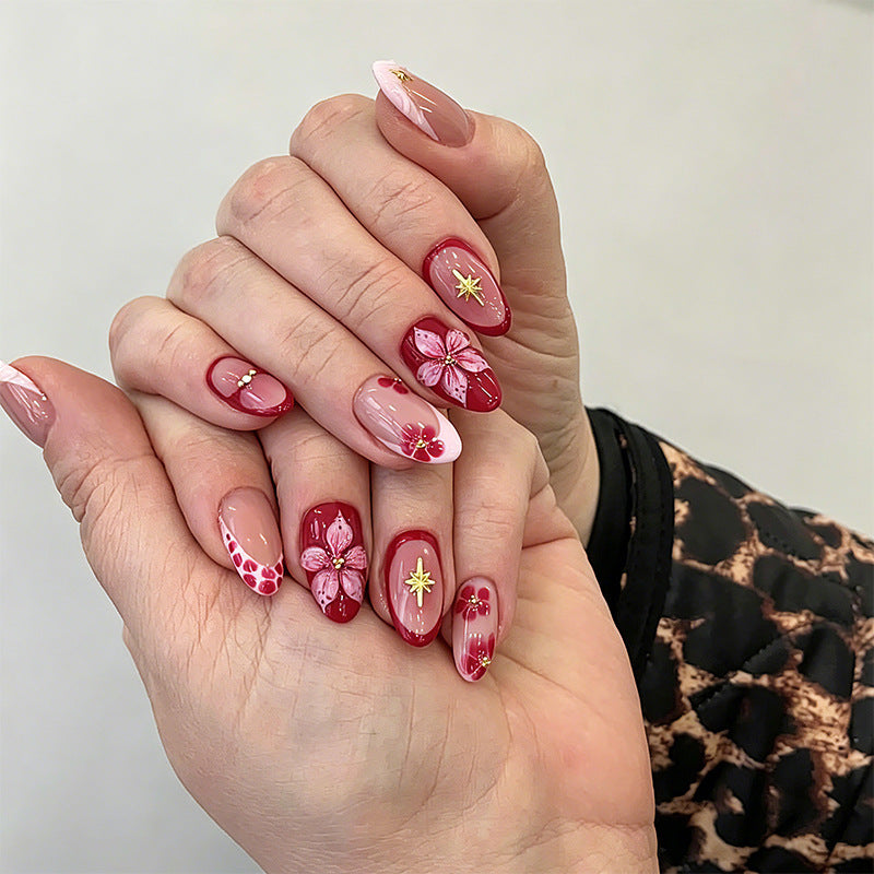 Artificial nails with floral design and glamorous accents Kalsten