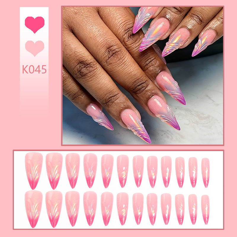 Artificial nails in modern design with pointed accents Kalsten