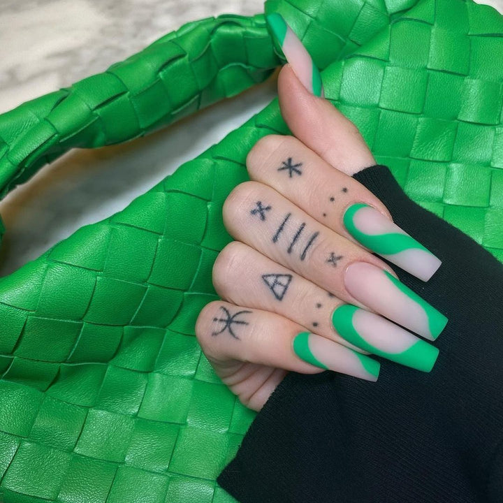 Artful nail art with modern French tip and colorful accents Kalsten