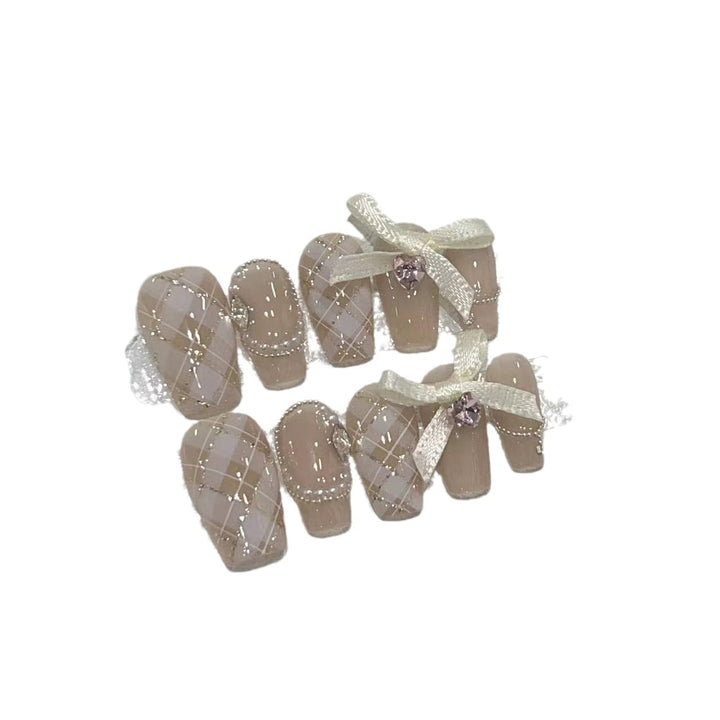Elegant Press-On Nail Art Set with Ribbons and Gemstone Accents Kalsten
