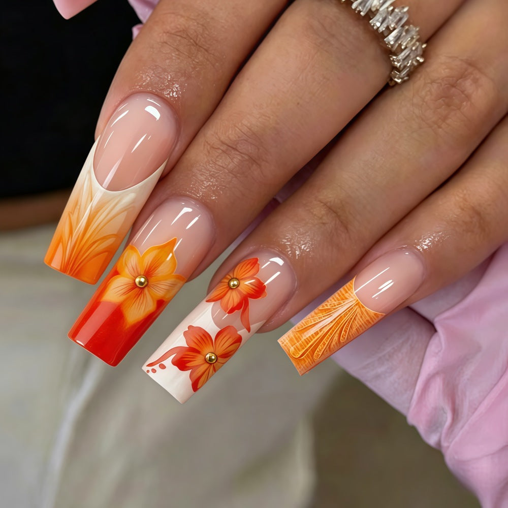 Nail art with floral accents and glitter Kalsten
