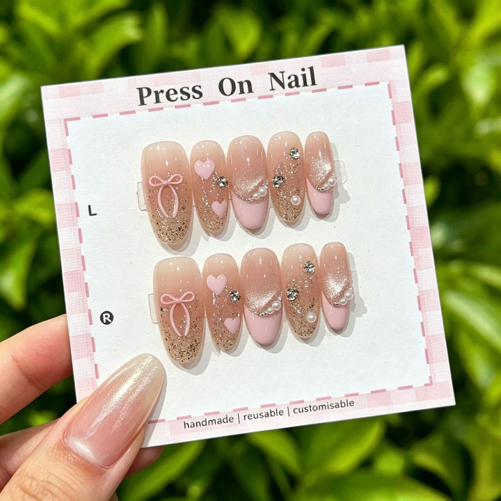 Artistic Press-On Nail Art Set with Cute Character and Bow Accents