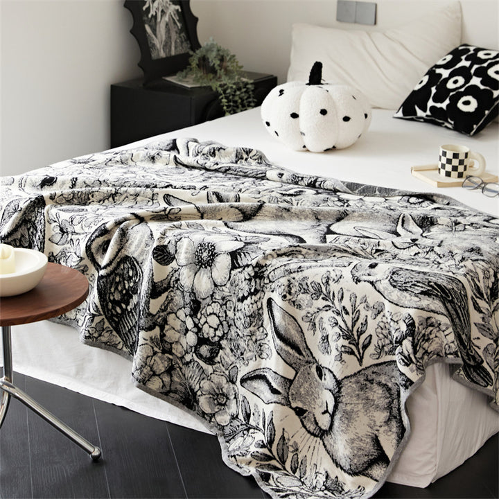 Cozy throw blanket with detailed jacquard animal motif