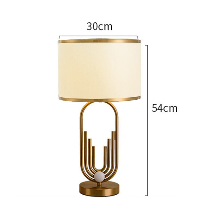 Artistic Table Lamp with Gold and Cream Features