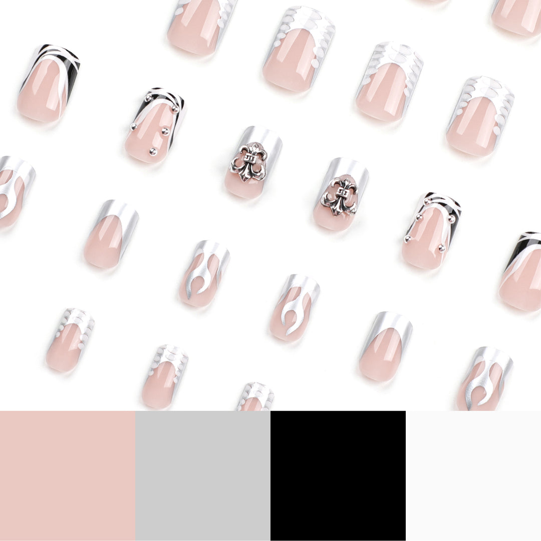 Artistic nail extensions with metallic embellishments Kalsten