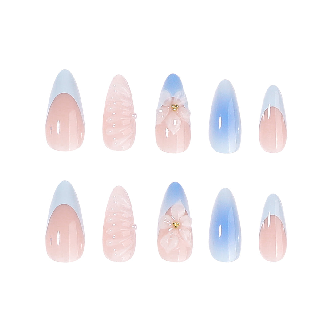 Stiletto nails with floral design and glitter accents Kalsten