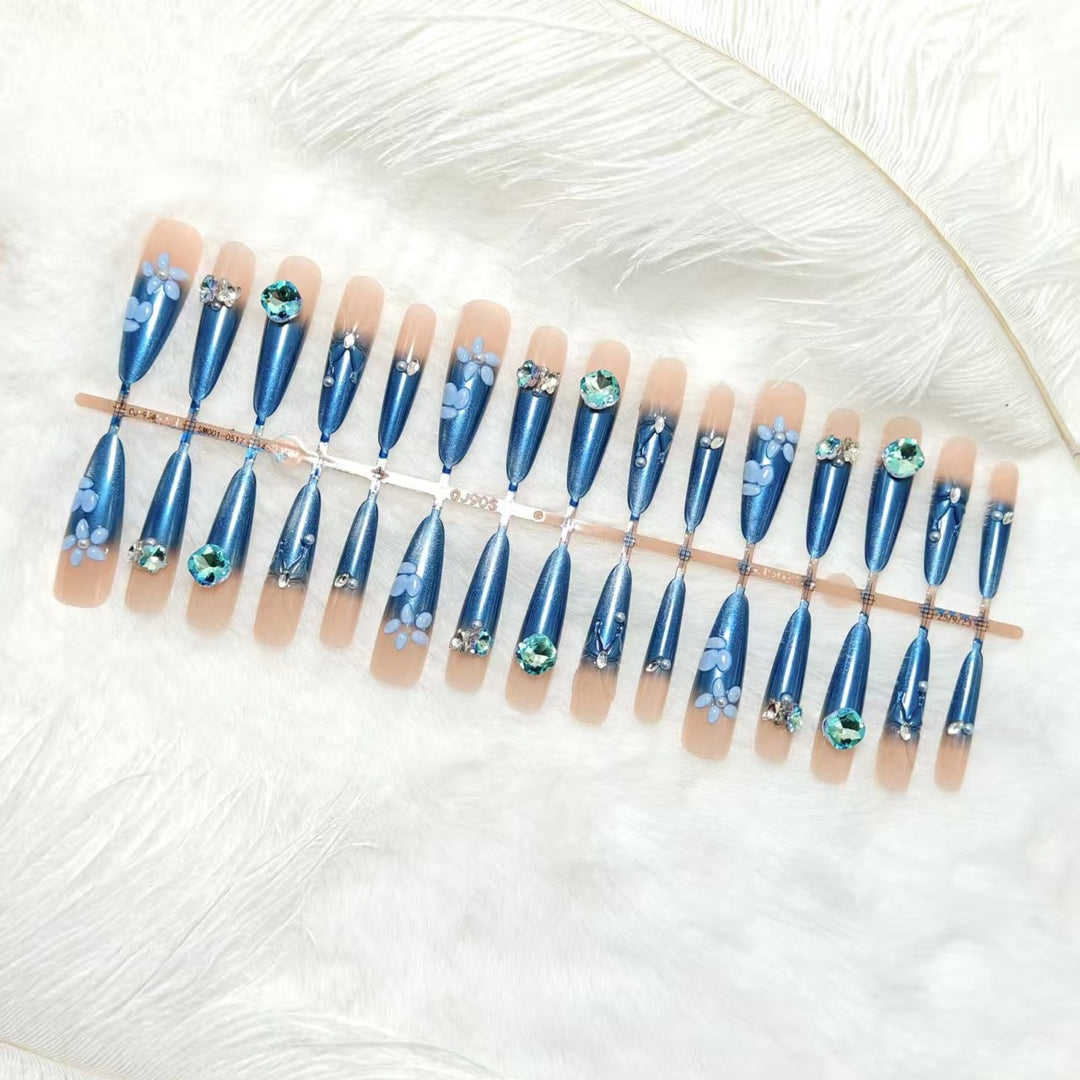 Elegant artificial nails with floral applications and glitter elements Kalsten