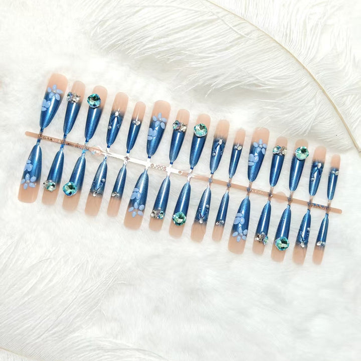 Elegant artificial nails with floral applications and glitter elements Kalsten