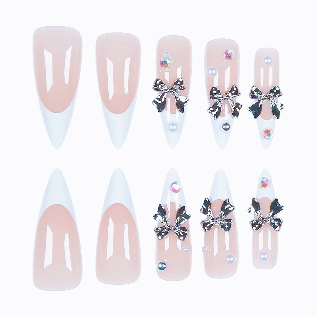 Acrylic nail set with elegant bows and sparkling accents Kalsten