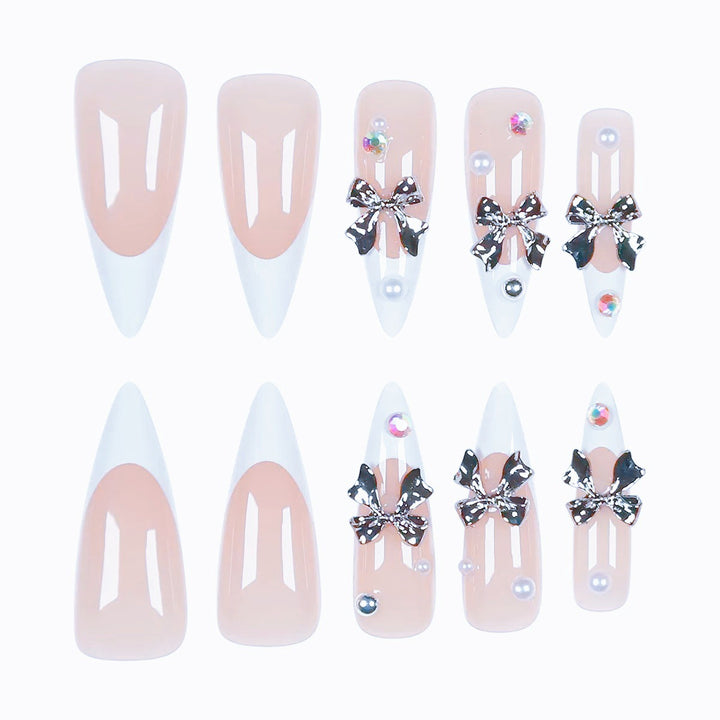 Acrylic nail set with elegant bows and sparkling accents Kalsten