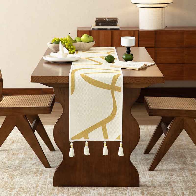 Light waffle beach towel with tassels and geometric jacquard pattern Kalsten