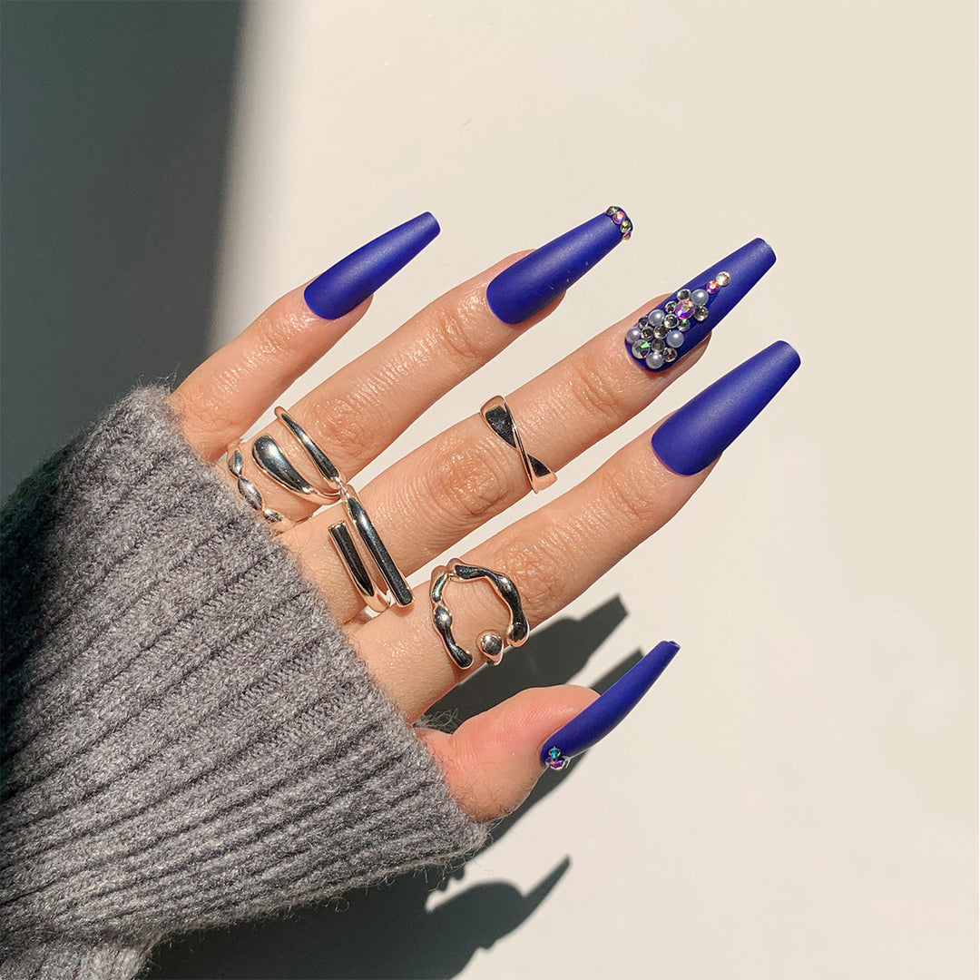 Nail extensions with elegant rhinestone embellishments Kalsten