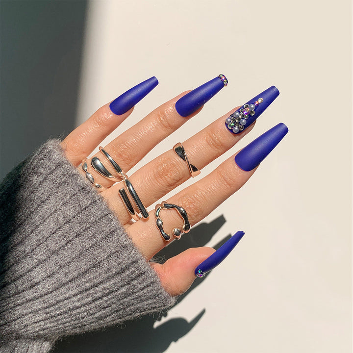 Nail extensions with elegant rhinestone embellishments Kalsten