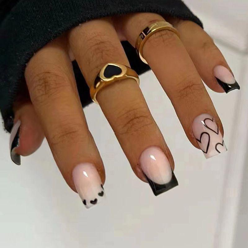 Elegant Heart-Embellished Nail Art Design Kalsten