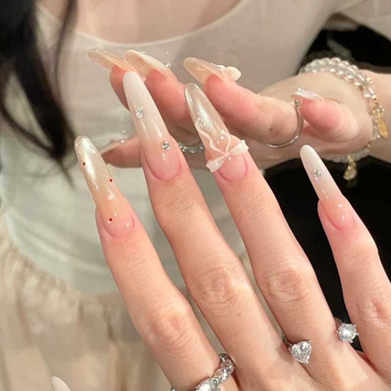 Elegant Stiletto Press-On Nails with Decorative Bow and Rhinestone Accents Kalsten