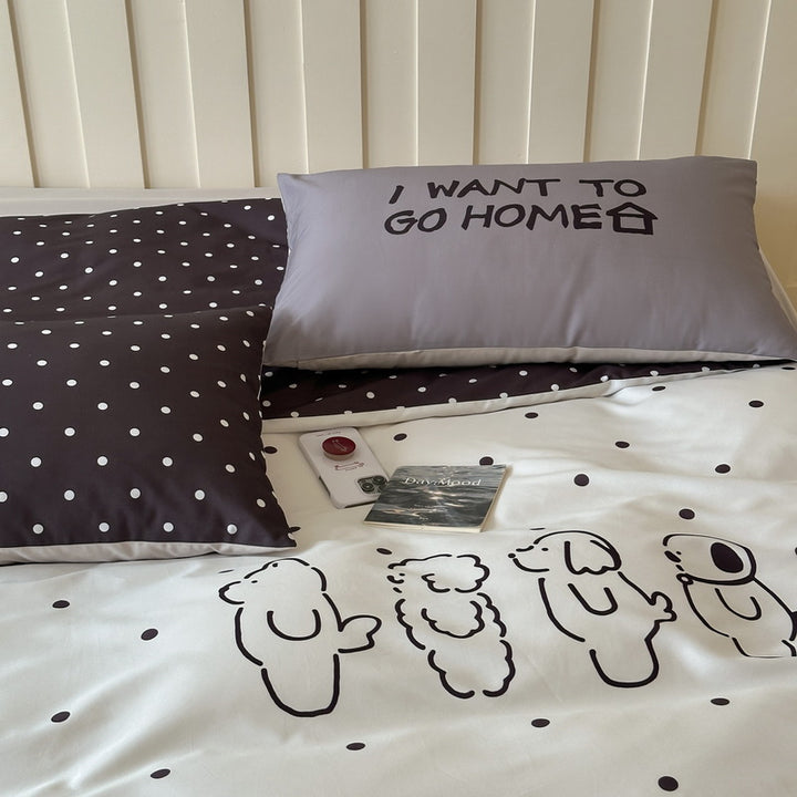 Reversible bedding set made of cotton blend with polka dot pattern and minimalist animal illustration